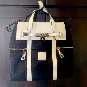 Henri Bendel.   Brand new never used Black White Jetsetter Back Pack/Tote